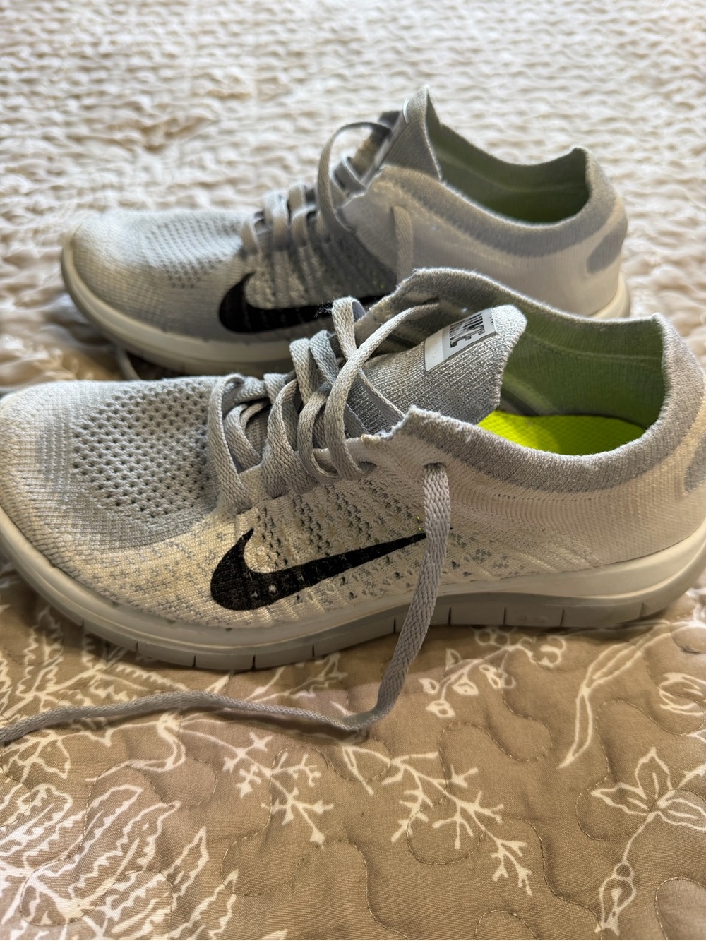 Nike Women’s Gray Flyknit 4.0 Athletic Trainers with Black Swoosh